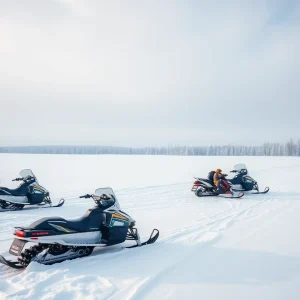 Snow-covered trails in Novi with parked snowmobiles