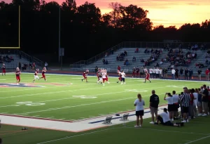 Novi Wildcats and Salem Rocks football teams playing on the field